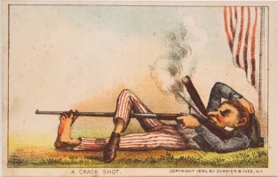 Man Lying On Grass Smoking A Cigar Aiming A Rifle Down Leg And Supported Through Toes Of His Left Foot