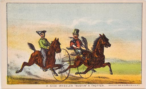 A rider atop horse at left racing a rider and a trotting horse