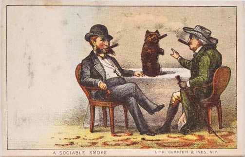 Two men seated around table smoking cigars while an animal sits on table between them also smoking a cigar