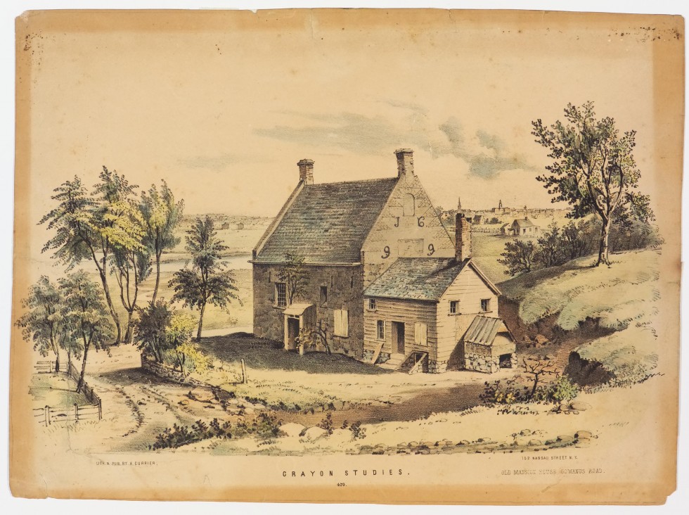 Stone house in center with 1699 written on west gable end of house