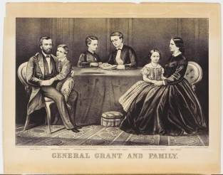 Two adults with three children - adults seated around table