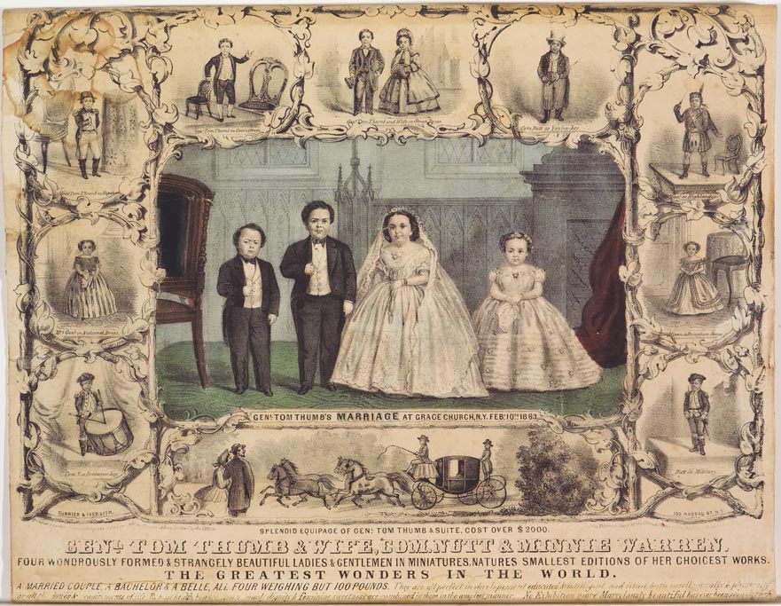 Bride and groom at center with attendee to each side