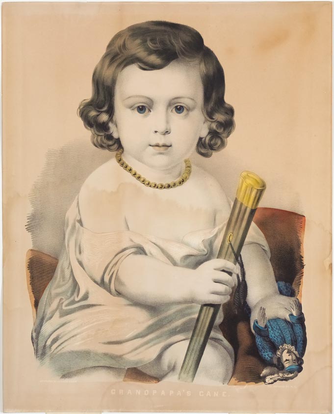 Young girl dressed in white dress looking directly at viewer