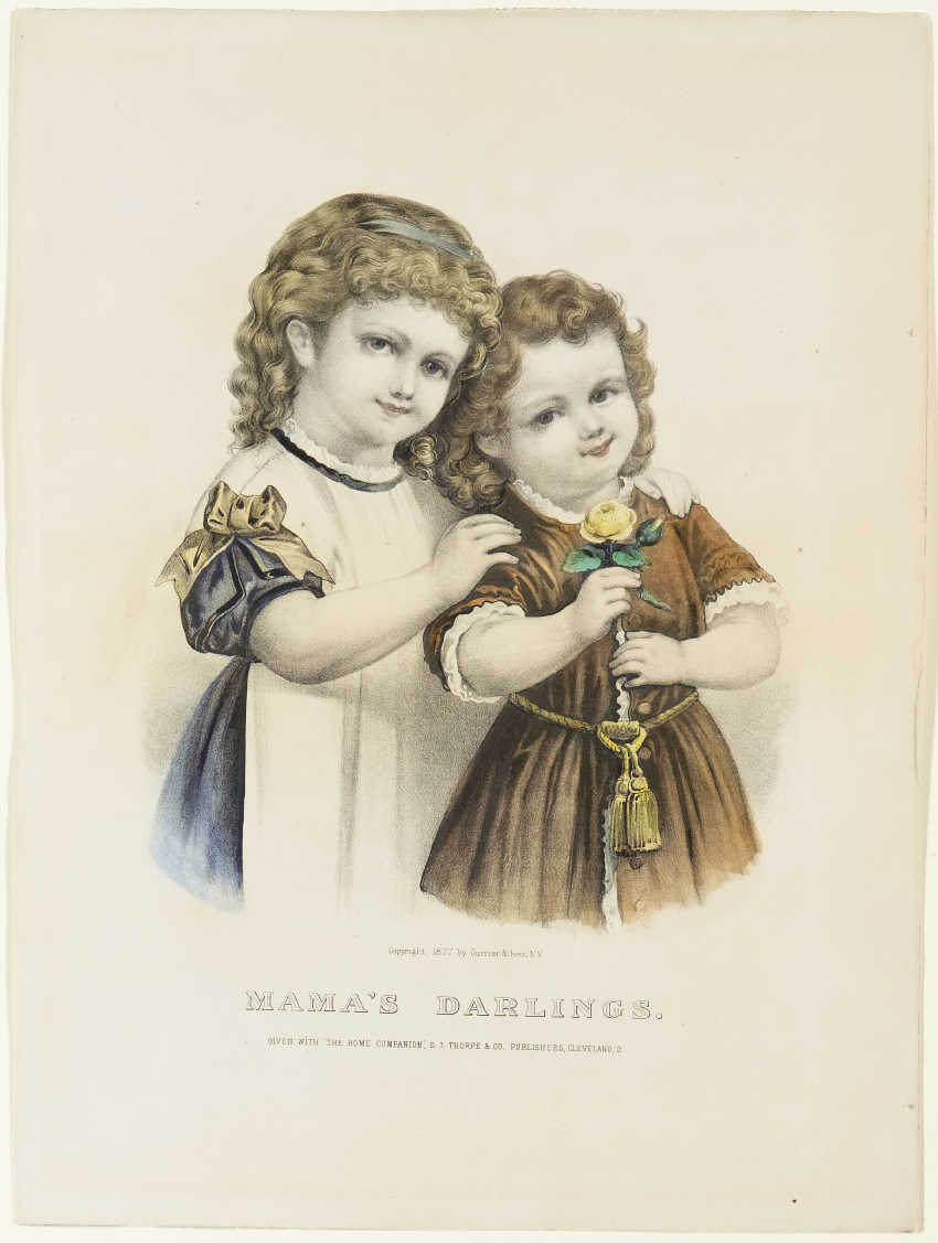 Two young girls looking forward at viewer