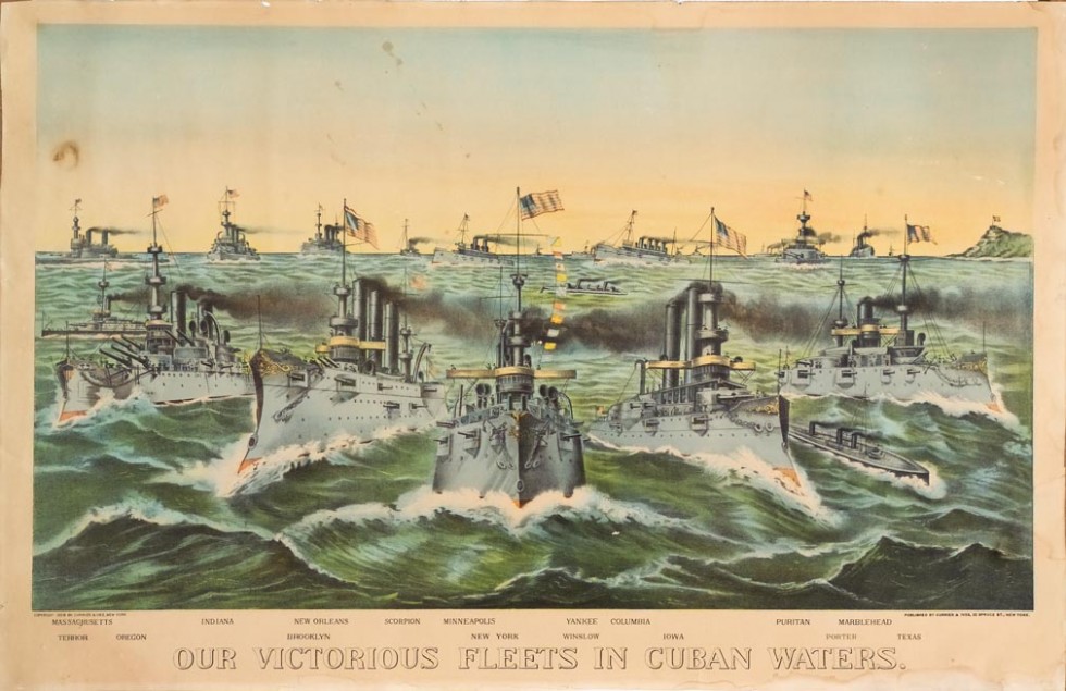 14 battle ships and submarines in background and 7 in foreground all flying the American flag