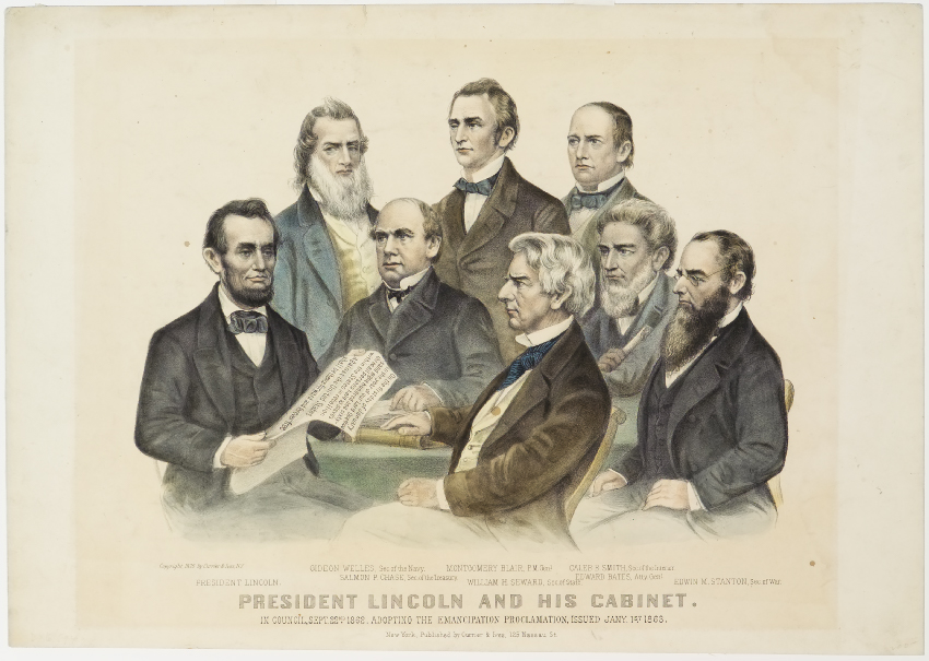 President Lincoln seated far left holding Emancipation 'Proclamation document in his hands