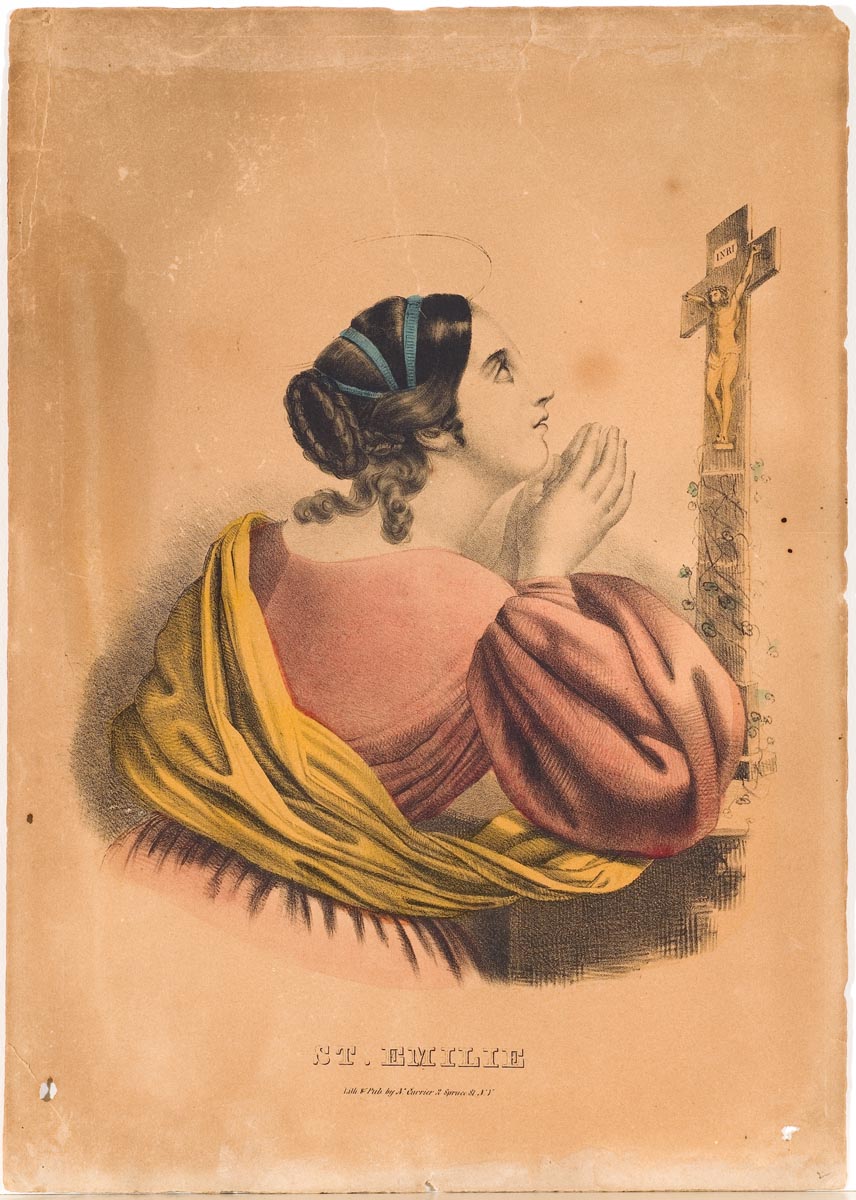 Woman praying at cross