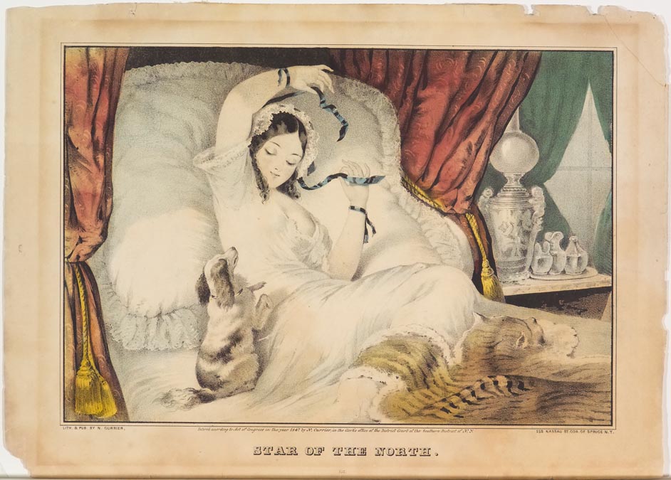 Woman reclining in her bed against pillows