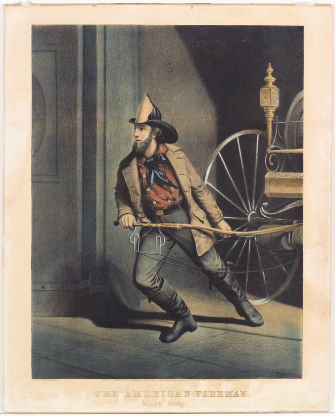 Fireman facing to his right in image moving to his right while pulling hitch of fire water wagon out of doorway - color image