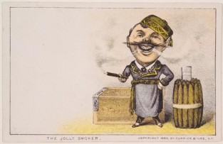 Man in Turkish hat and a belted robe smoking a cigar standing in front of closed box and standing up cluster of cigars to his left