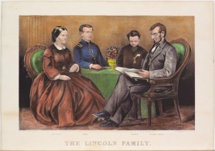 Four people gathered around table
