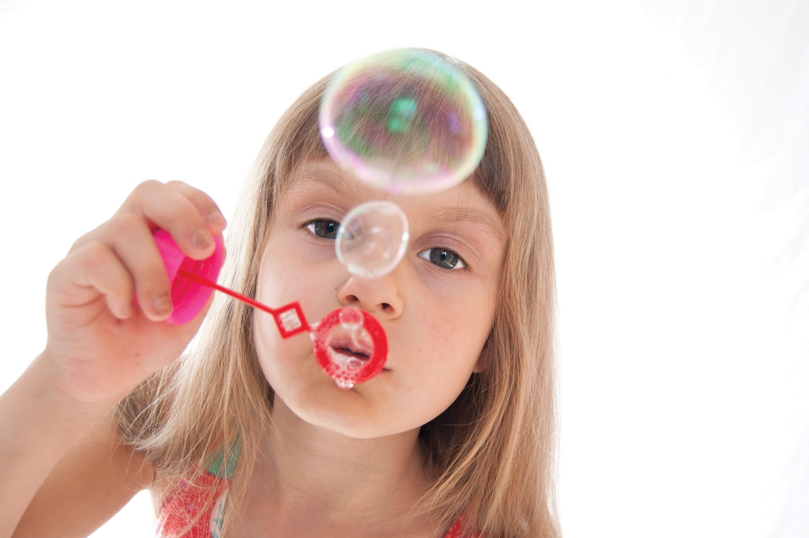 Girl blowing bubbles