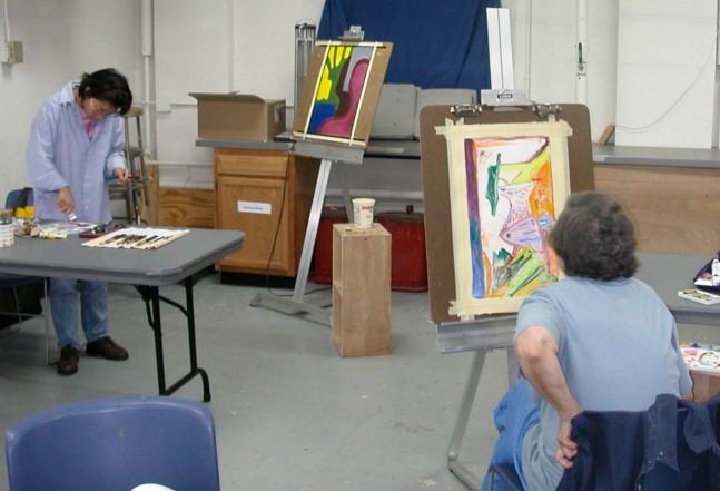 students wotking with oil paints