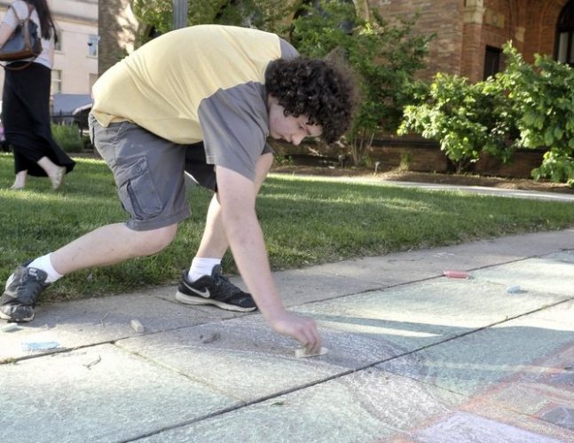 Chalk artist David Krawcyzk; Springfield Republican photo by Frederick Gore