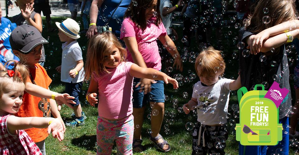 Kids dancing with bubbles