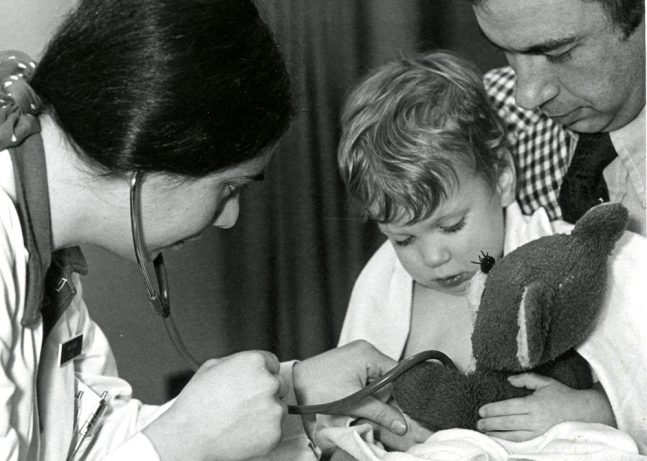 Female Doctor with young boy
