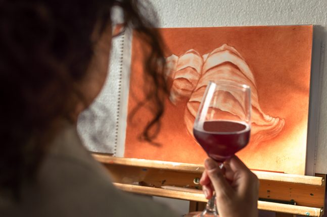 Woman drinking a glass of wine