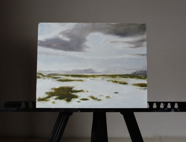Winter landscape painting on an easel