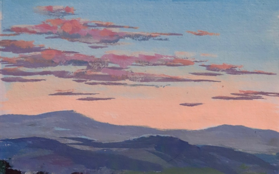 Painting of sunset over mountains