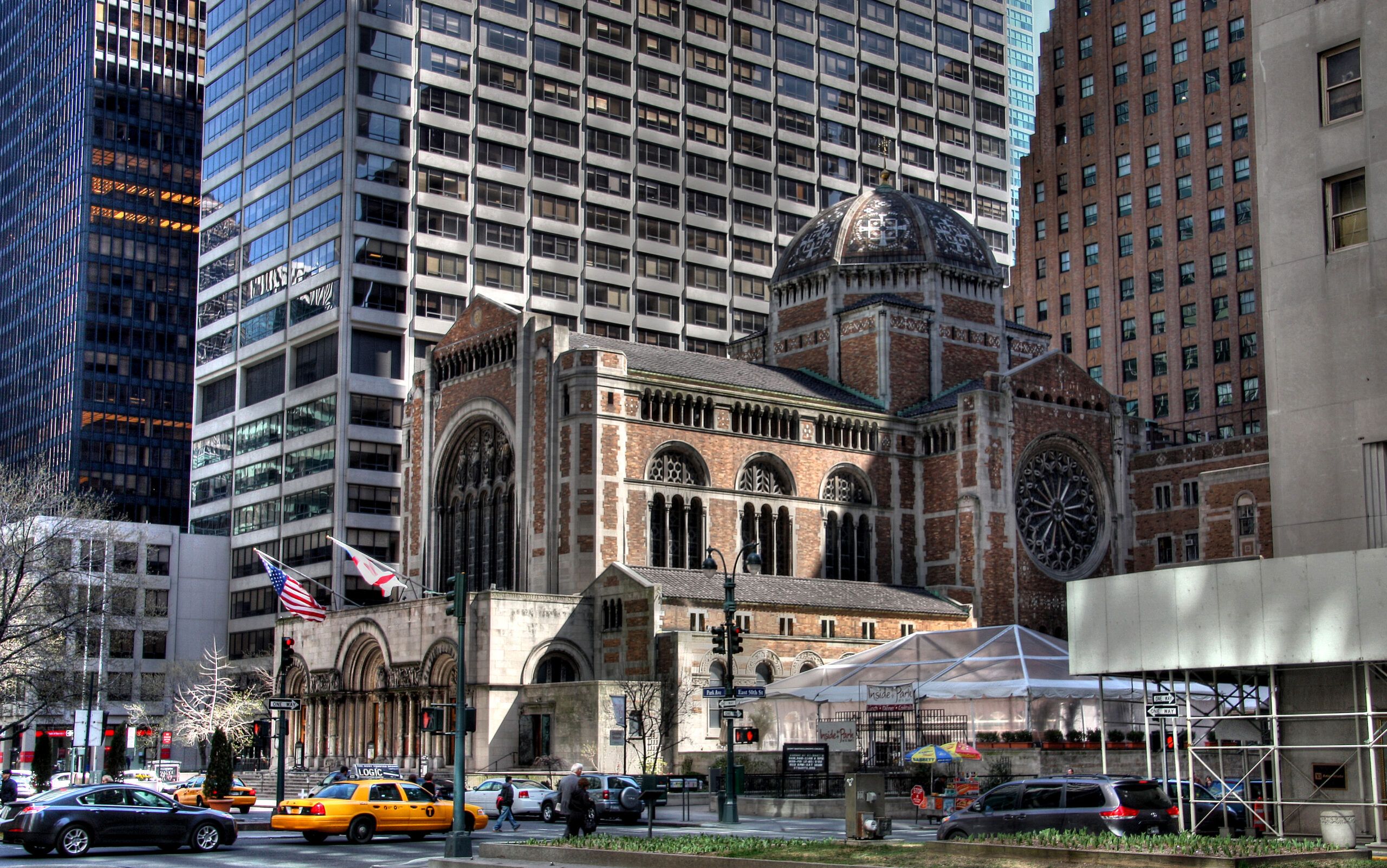 Church surrounded by modern buildings