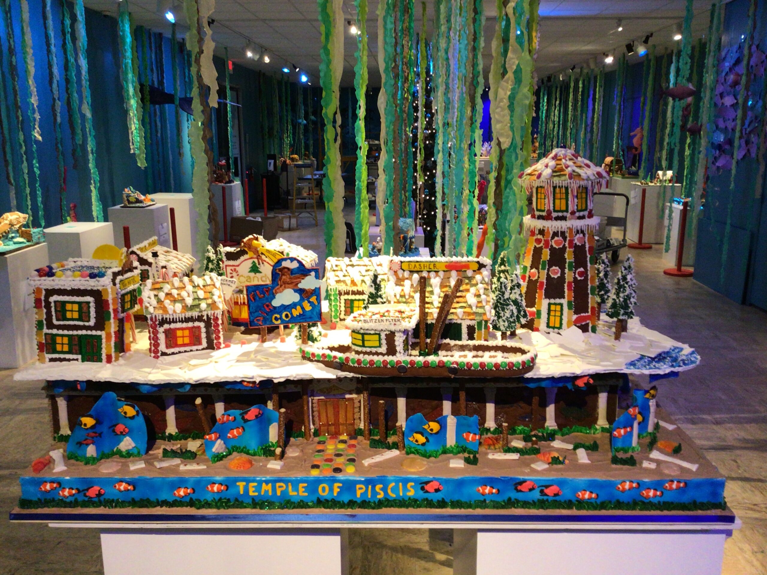 Elaborate gingerbread structure of a temple and gallery about 4 feet long and 3 feet high