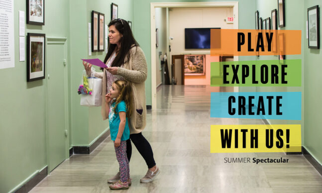 Mother and daughter tour a gallery with framed photos