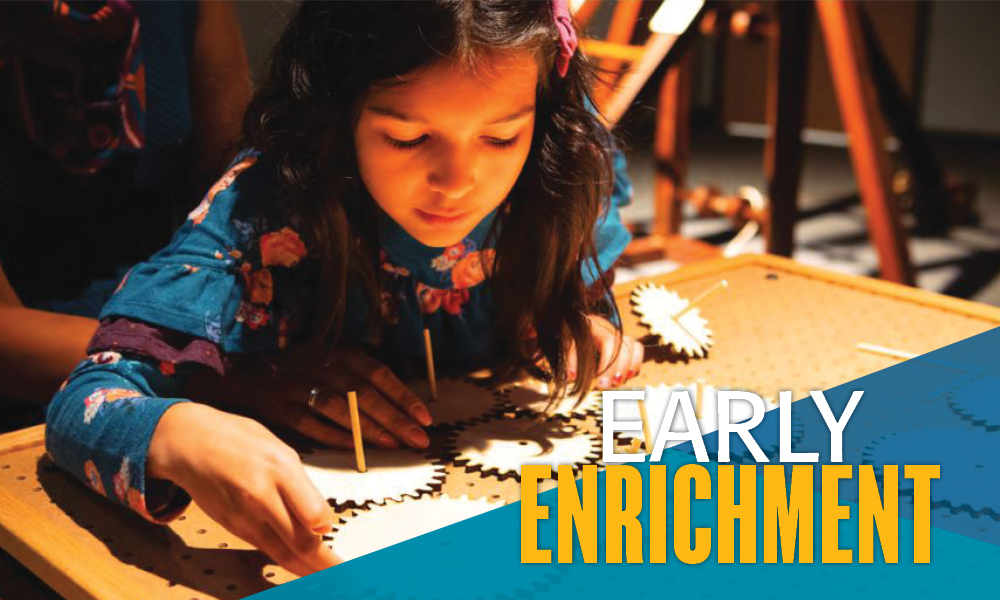 Girl working with a gear puzzle