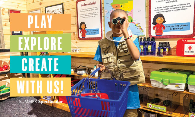 Boy looking through binoclars