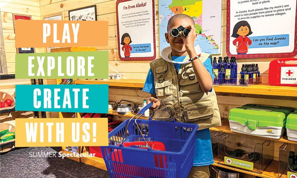 Boy looking through binoclars