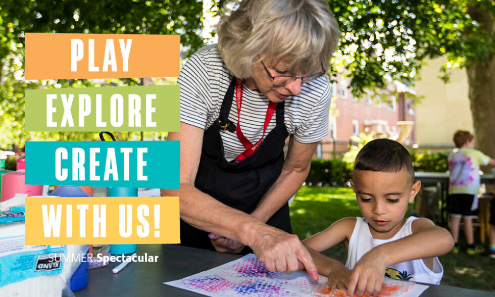 Young child and older woman printmaking