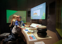 Visitors use a variety of noise-making tools to add sound effects to an original animation.