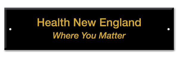 Plaque reading "Health New England"