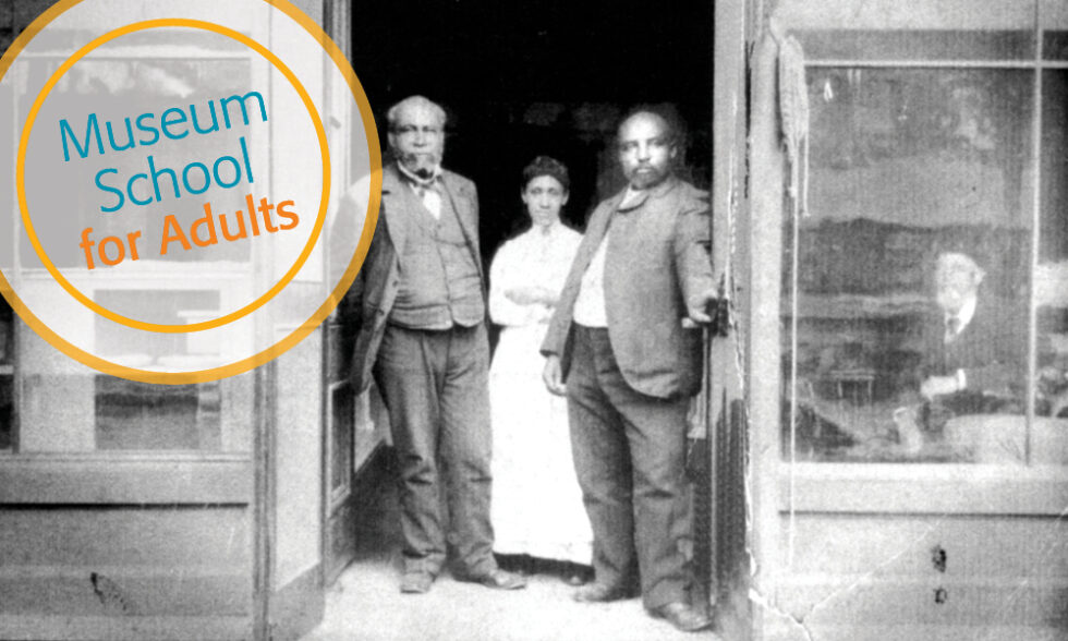 Historical photo of three African Americans outside a storefront