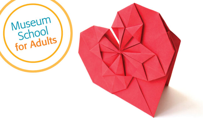red paper heart made in origami technique