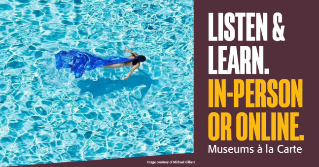 Overhead view of a woman swimming in a pool wearing a long blue dress