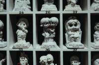 6. Tell Me About It (detail), 2018-2025, Donna Castellanos, vintage Silly Sculpture statues, handmade books, typewriters. Interactive installation. Courtesy of the artist