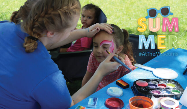 Young girl sitting fr face painting