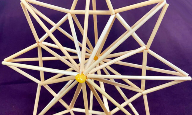 Close up detail of a 3D star made from straw