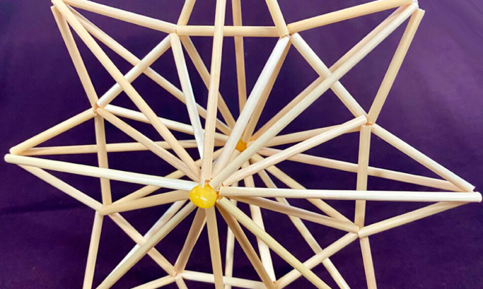 Close up detail of a 3D star made from straw