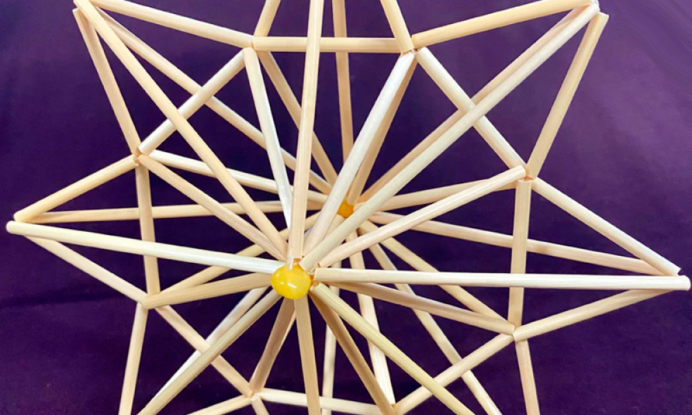 Close up detail of a 3D star made from straw